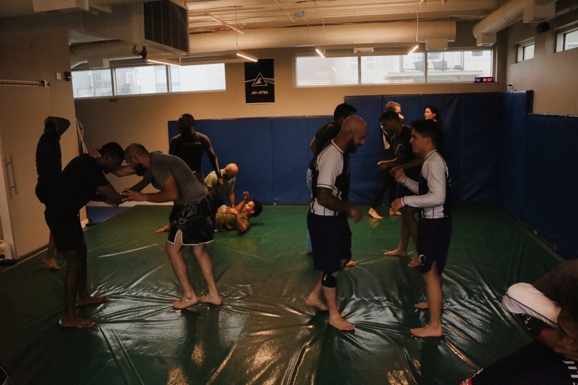 A Brazilian Jiu-Jitsu class training on the mats at Wiley Jiu-Jitsu YYC in Calgary