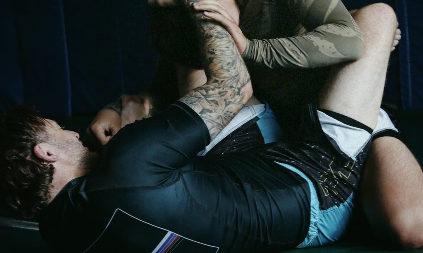 Two students working from guard during a no-gi class at Wiley Jiu-Jitsu YYC in Calgary